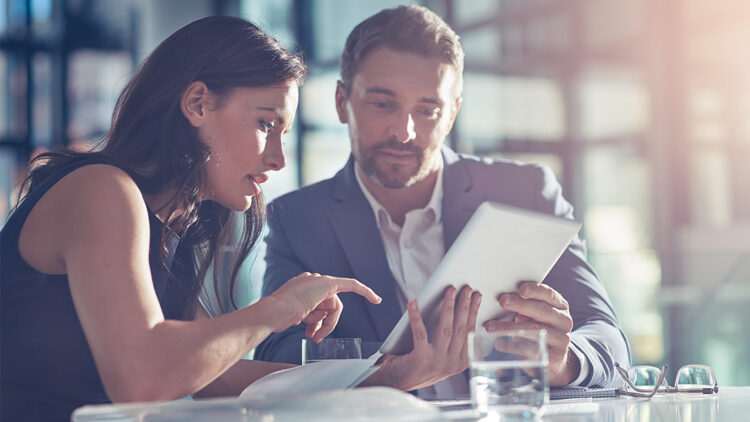 Colleagues with an ipad